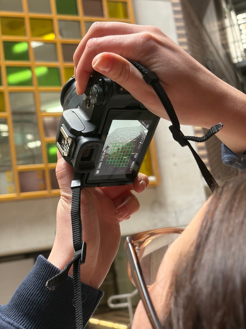 Canon EOS M50 Mark II rear touchscreen during a Melbourne photography course, mode dial set to M for manual mode