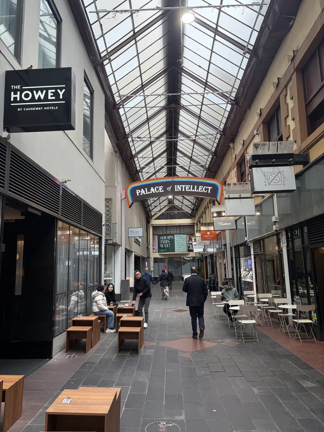 A glass-roofed heritage arcade in Melbourne CBD with a gabled skylight, shot during the Fujifilm photography course walk