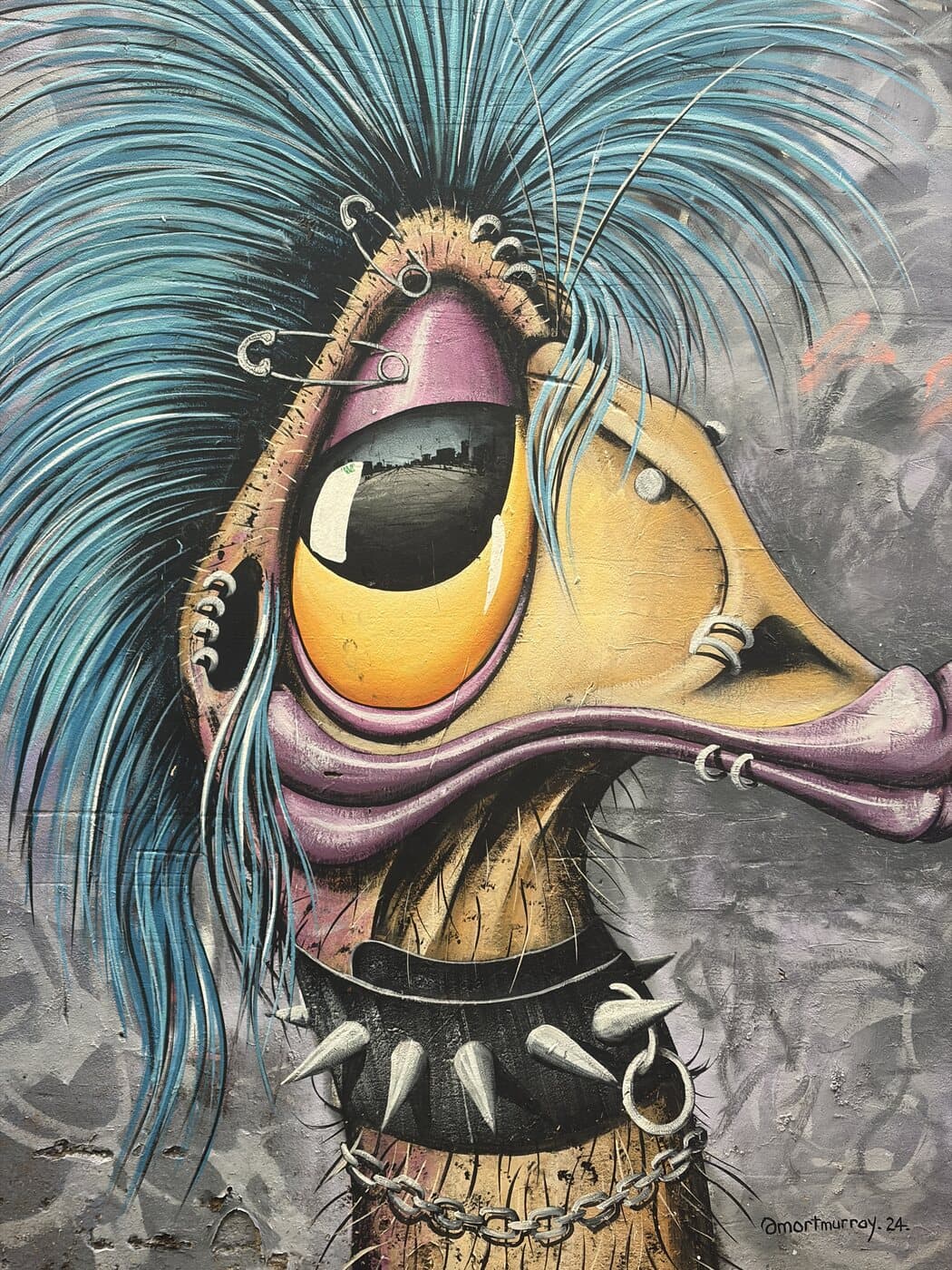 A spray-painted punk bird with blue hair and a spiked collar on a Melbourne laneway wall, a subject on the photography course walk